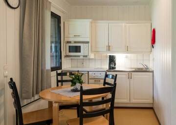 Фото номера Апартаменты (для 2 взрослых и 2 детей) Курортные отели Holiday Centre Huhmari г. Хухмарисваара 8