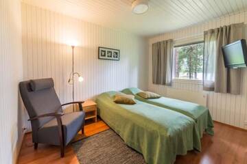 Фото номера Вилла с сауной (2 взрослых + 2 детей) Курортные отели Holiday Centre Huhmari г. Хухмарисваара 4